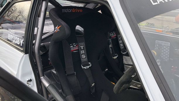 A seat inside the rally car.